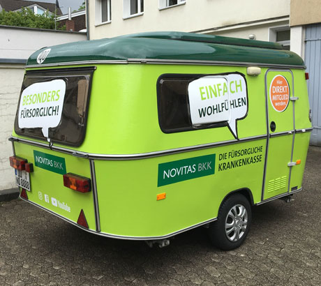 Professionelle Folierung Wohnwagen Hymer mit Unternehmensbranding